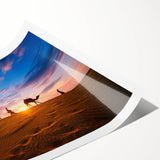 Desert landscape wall art print showcasing vibrant hues of orange and yellow against a tranquil blue sky, rolled and ready for framing or display.