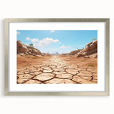 Framed desert landscape wall art featuring warm sandy tones and intricate details, set in a sleek silver frame with a mat, ideal for home decor.