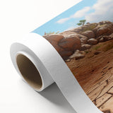 Desert-themed wall art design on rolled canvas, showcasing vibrant colors and intricate patterns, ideal for modern home decor, packaged securely in a cardboard tube.