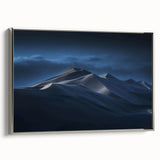 Framed wall art featuring a serene desert landscape with rolling sand dunes in soft beige and gold tones, elegantly displayed in a sleek silver frame, perfect for modern home decor.