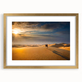 Framed wall art depicting serene sand dunes landscape in gold-toned frame with mat, ideal for modern home decor and nature-themed interiors.