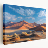 Side view of a stretched canvas wall art piece featuring a vibrant desert dunes landscape, showcasing warm sandy tones and soft curves, perfect for home decor.