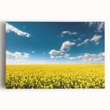 Vibrant stretched canvas wall art showcasing a serene landscape with lush green fields and blue skies, perfect for adding a calming touch to home decor.