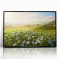 Framed wall art featuring a vibrant landscape design with fields in rich green and gold hues, presented in a sleek black frame, ideal for home decor.