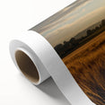 Vibrant rolled canvas showcasing a serene landscape with lush green fields and a dramatic sky, perfect for home decor or art enthusiasts, delivered in protective packaging.
