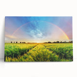 Stretched canvas wall art showcasing a vibrant landscape design with fields and mountains, leaning against a neutral wall, perfect for home decor.