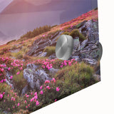 Close-up of a vibrant acrylic glass wall art piece showcasing a colorful landscape design with fields and hills, perfect for modern home decor.