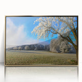 Framed wall art piece showcasing a vibrant landscape with golden accents, perfect for home decor. This acrylic design adds elegance and warmth to any room.