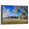 Framed canvas wall art showcasing a serene landscape of rolling fields in earthy tones, displayed from a black side view, ideal for enhancing home decor.