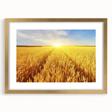 Framed wall art showcasing a serene landscape with rolling fields, featuring a gold mat and frame, perfect for home decor or office ambiance.