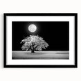 Framed wall art featuring a serene landscape with fields and vibrant colors, set in a sleek black frame with a white mat, perfect for home décor.