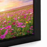 Close-up of a framed canvas wall art piece depicting a vibrant landscape of rolling fields, featuring rich greens and earthy tones, perfect for home decor.