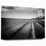 Vibrant acrylic landscape wall art collection showcasing serene fields and nature, presented in a sleek glass frame with a side view, enhancing modern decor.