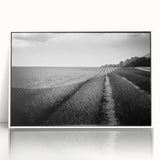 Framed acrylic wall art featuring a serene landscape of golden fields under a bright blue sky, showcasing vibrant colors and modern design elements, perfect for home decor.