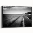 Framed canvas wall art showcasing a vibrant landscape field design with rich colors, presented with a sleek black frame, ideal for modern home decor.
