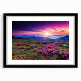 Framed wall art showcasing a serene landscape of rolling green fields, elegantly displayed in a sleek black frame with a mat, enhancing any decor.