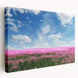 Stretched canvas wall art showcasing a serene landscape of rolling fields in soft green and golden hues, perfect for enhancing home decor with a nature-inspired theme. Ideal for living rooms or offices, this piece adds tranquility and beauty to any space.