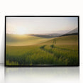 Framed black acrylic wall art showcasing a vibrant landscape design featuring rolling green fields and a serene sky, ideal for enhancing modern decor.