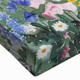 Close-up of a stretched canvas wall art piece showcasing a vibrant landscape garden design, featuring lush greenery and colorful flowers, perfect for home decor.