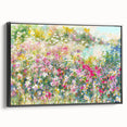 Framed canvas wall art showcasing a vibrant landscape garden design, featuring lush greenery and colorful blooms, presented in a sleek black frame from a side view.