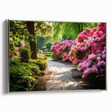 Framed canvas wall art showcasing a vibrant garden landscape design, featuring lush greenery and colorful flowers, elegantly displayed with a sleek silver frame. Ideal for home decor.