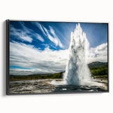 Framed canvas wall art showcasing a vibrant geyser landscape design, featuring rich colors and intricate details, set against a sleek black frame for a modern touch.