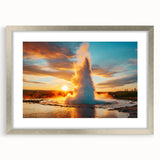 Framed wall art featuring a stunning geyser landscape design, displayed with a silver mat and frame, ideal for enhancing modern home decor. The striking colors and intricate details make it a captivating centerpiece for any room.