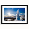 Framed wall art featuring a modern geyser landscape design, mounted with a black mat, showcasing vibrant colors and intricate details, perfect for home decor.