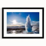 Framed wall art featuring a modern geyser landscape design, mounted with a black mat, showcasing vibrant colors and intricate details, perfect for home decor.