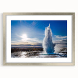 Framed wall art featuring a stunning geyser landscape design, set in a sleek silver frame with a mat, perfect for enhancing modern home decor.