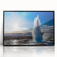 Framed wall art featuring a stunning landscape design of a geyser, showcased in a sleek black frame, perfect for modern home decor. The acrylic surface enhances the vibrant colors and details, making it a striking focal point for any room.