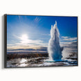 Framed canvas wall art showcasing a stunning geyser landscape design with vivid colors and intricate details, presented in a sleek black frame, perfect for modern decor.