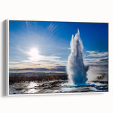 Framed canvas wall art showcasing a stunning geyser landscape design in vibrant colors, set against a white background, perfect for home decor.