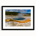 Black-framed landscape wall art featuring a geyser design with intricate details and a mat, ideal for modern home decor. Adds elegance to any living space.