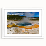 Framed wall art featuring a geyser landscape design with a white mat, showcasing vibrant colors and intricate details, perfect for home decor.