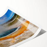 Colorful geyser landscape wall art print featuring vibrant blues and greens, rolled for easy transport, ideal for enhancing home decor with a natural theme.