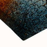 Close-up of a vibrant stretched canvas wall art featuring a geyser landscape design, showcasing rich colors and intricate details, perfect for home decor.