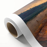 Rolled canvas art showcasing a vibrant geyser landscape design in blues and greens, ideal for home decor. Packaged securely in a cardboard tube for safe delivery.