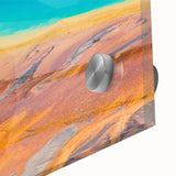 Close-up of a vibrant acrylic glass wall art piece showcasing a stunning geyser landscape design, ideal for modern home decor, with vivid colors and intricate details.