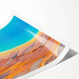 Vibrant rolled print showcasing a stunning geyser landscape design, perfect for home decor, featuring rich colors and intricate details, packaged securely in a cardboard tube.
