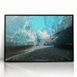 Framed acrylic wall art showcasing a stunning glacier landscape design, featuring vibrant blues and whites, elegantly displayed in a sleek black frame, perfect for modern decor.