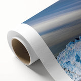Rolled canvas showcasing a stunning glacier landscape design with vibrant blues and whites, ideal for home decor; elegantly packaged in a protective tube.