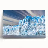Stretched canvas wall art showcasing a stunning glacier landscape design with vibrant blue and white hues, leaning against a textured wall, perfect for home decor.