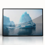 Framed wall art showcasing a stunning glacier landscape design with vibrant blues and whites, set in a sleek black frame, ideal for modern decor.