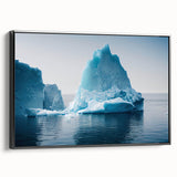 Framed canvas wall art showcasing a stunning glacier landscape design, featuring vibrant blues and whites. The artwork is presented in a sleek black frame, adding elegance to any room decor. Perfect for nature enthusiasts and home styling.