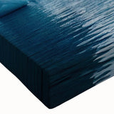 Close-up of a stretched canvas artwork showcasing a stunning glacier landscape design with vibrant blues and whites, ideal for modern home decor.