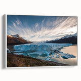 Framed canvas wall art featuring a serene glacier landscape design, showcasing cool blue and white tones, perfect for modern home decor. The artwork is presented in a sleek white frame, emphasizing its elegant aesthetic.