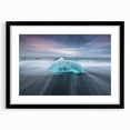Framed wall art featuring a stunning glacier landscape design, with a sleek black frame and mat, showcasing icy blues and whites, perfect for modern decor.