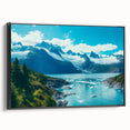 Framed canvas wall art showcasing a stunning glacier landscape design, featuring vibrant blues and whites, displayed from a side view against a neutral background.