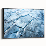 Framed canvas wall art featuring a stunning glacier landscape design, showcasing vibrant blue and white hues, with a sleek black frame for an elegant side view presentation. Perfect for enhancing modern home decor and bringing a touch of nature indoors.